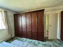 Thumbnail for Large dark wood cupboards and units