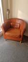 Thumbnail for Two tan brown tub chairs