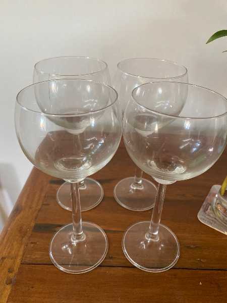 Thumbnail for Four matching wine glasses