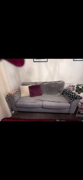 Grey two seater sofa