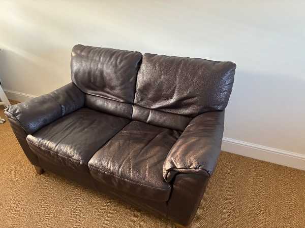 Two seater brown leather sofa