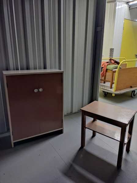 Small laminated cupboard/cabinet and side table.