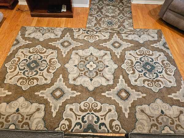 Free carpets and armchair.