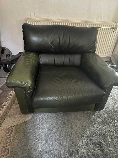 1960s dark green leather armchair