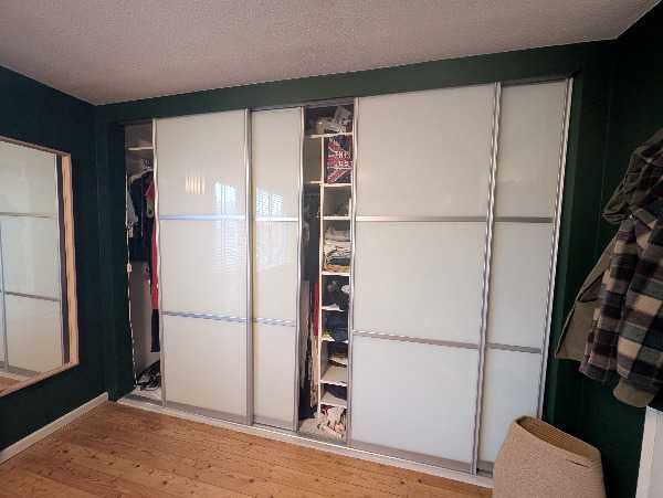 Sliding wardrobe doors and tracks