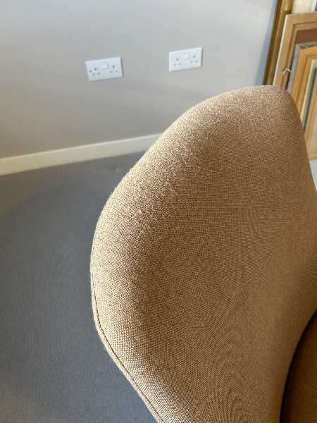 Small light brown armchair