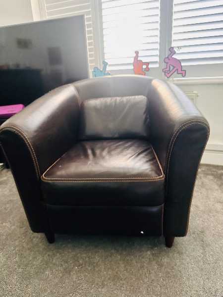Brown leather armchair