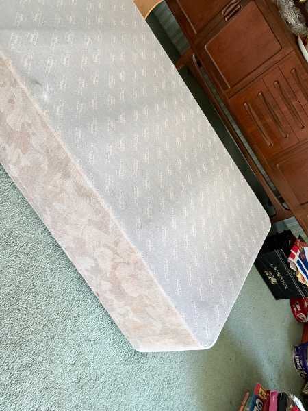 Two single bed bases and mattresses