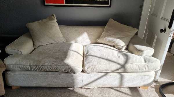Large Cream coloured 3/4 seater sofa.