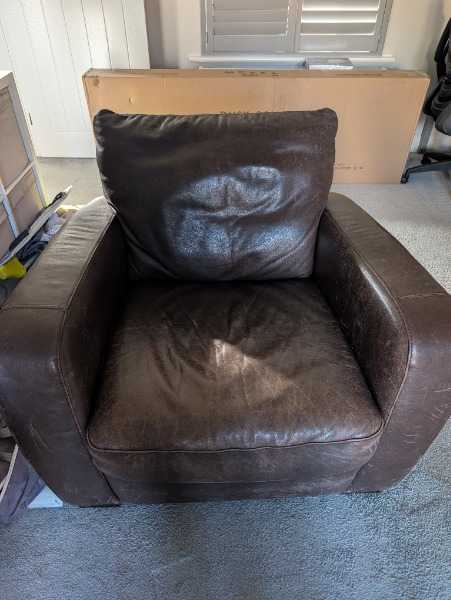 Brown leather armchair