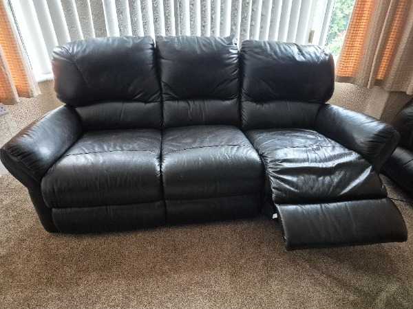 Black 3 seater leather couch