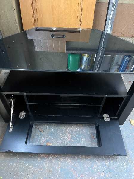 Black Glass TV stand with cupboard underneath