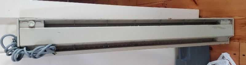 Freecycle: Electric Heater, baseboard type.