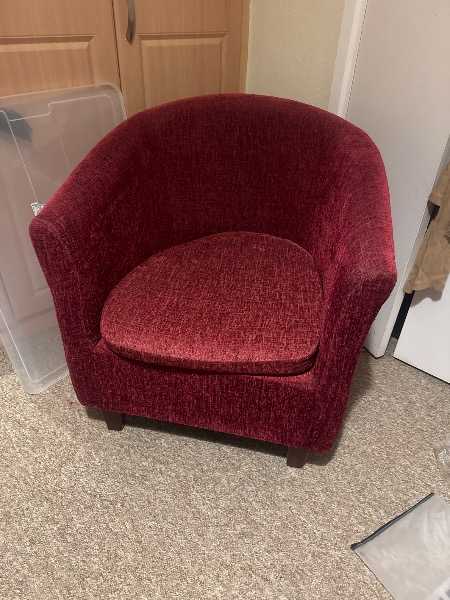 Burgundy colour tub chair armchair.