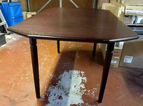 Heavy dark wood dining table seats 6-8