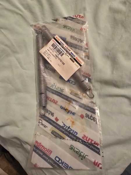 Dishwasher door spring
