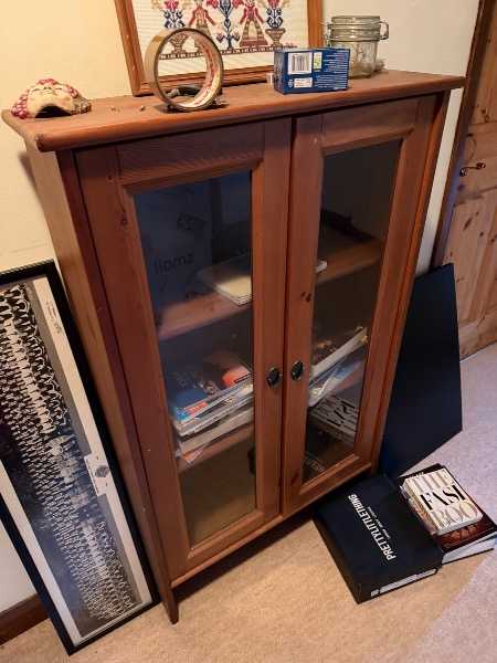 Glass fronted small bookcase