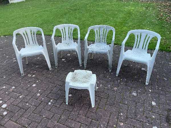4 Plastic Garden Chairs and small plastic table