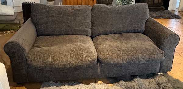 Two matching three seater sofas
