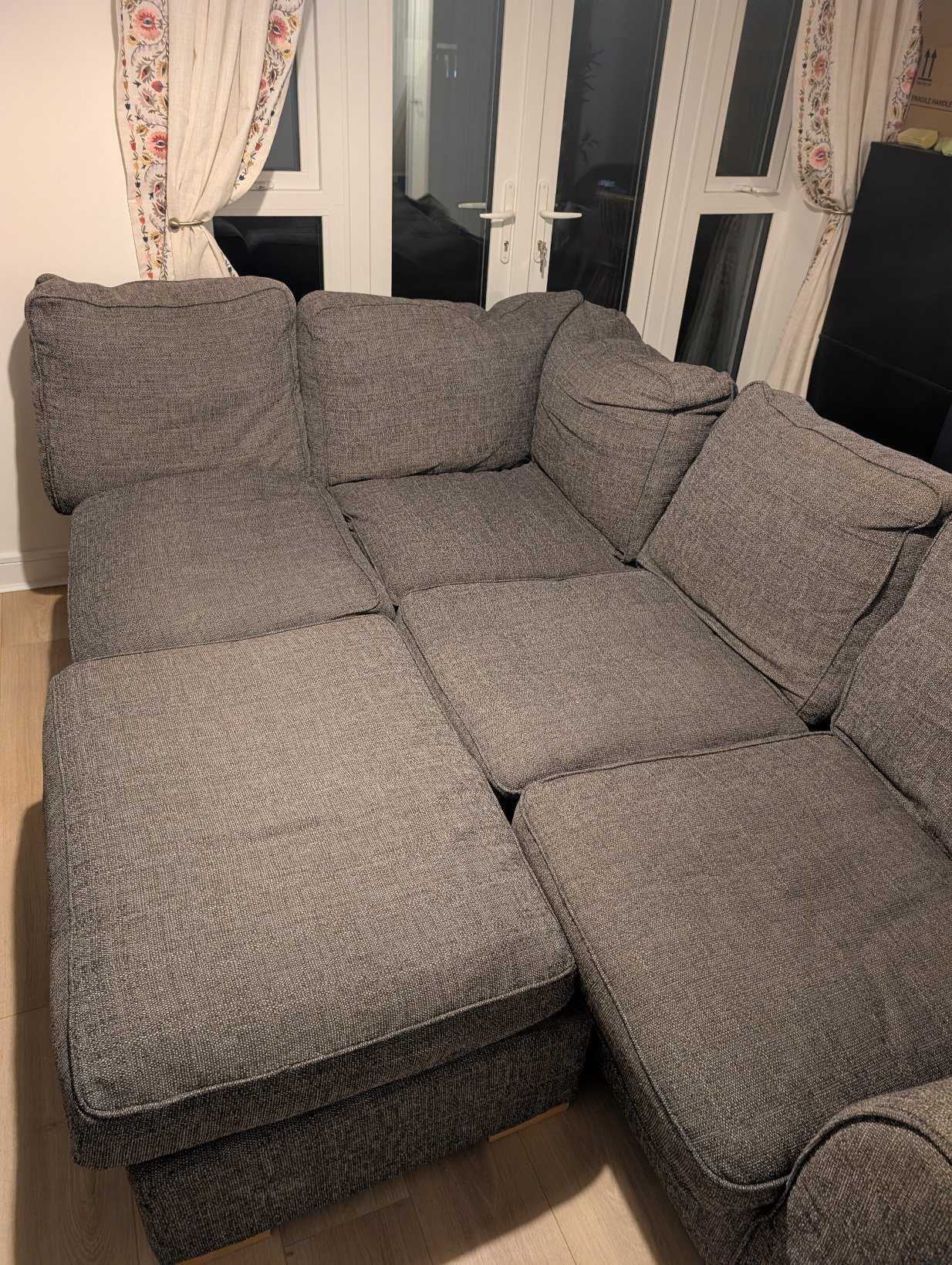 4 seater L-shaped sofa with foot rest