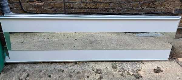 A free pair of large panel mirrors