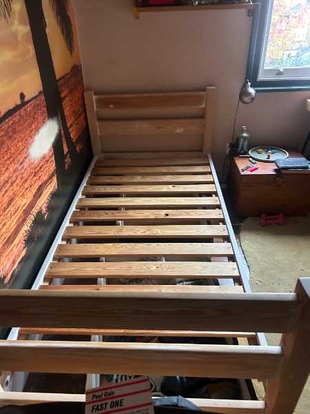 two single wooden beds