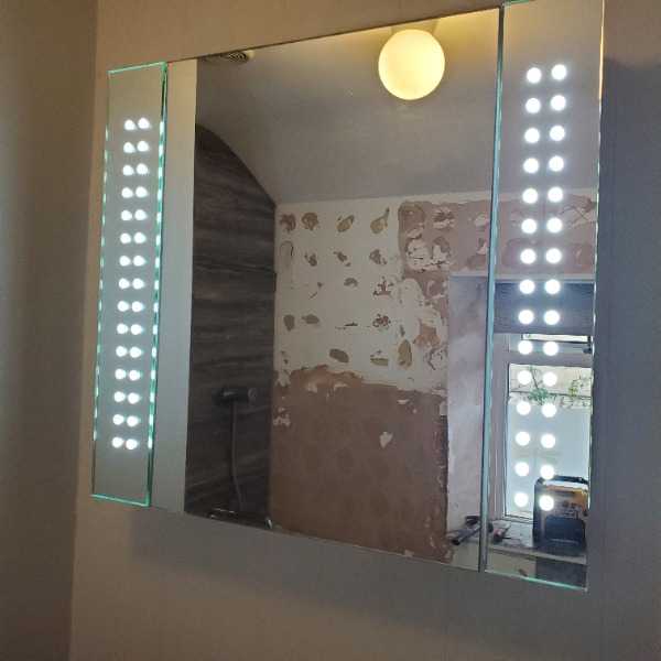 mirrored bathroom cabinet with lights