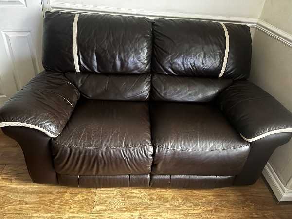 Brown leather sofa and storage footstool